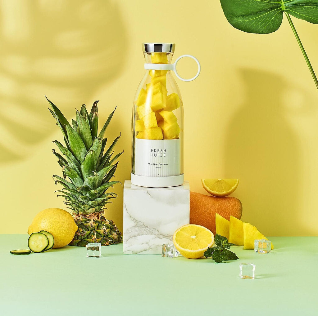 Portable blender bottle for smoothies on the go