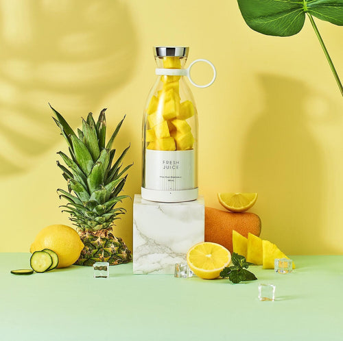 Portable blender bottle for smoothies on the go